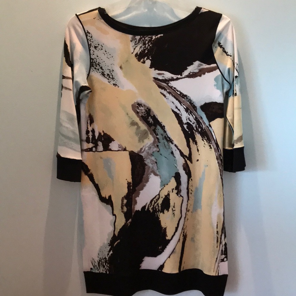 Eva Varro small tunic top with various colors, w black cuffs and hemline.